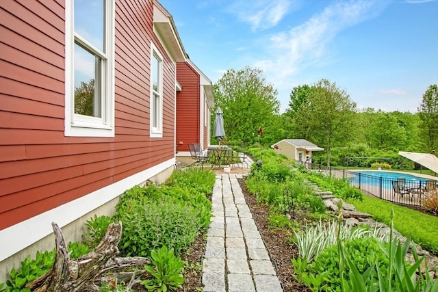 144 Worcester Rd, New Braintree, MA 01531 - view of side of property with a patio and an outdoor structure
