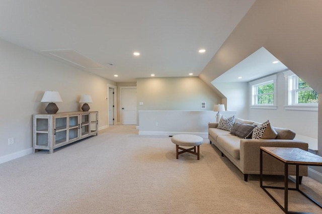 sitting room featuring baseboards, attic access, recessed lighting, and light colored carpet