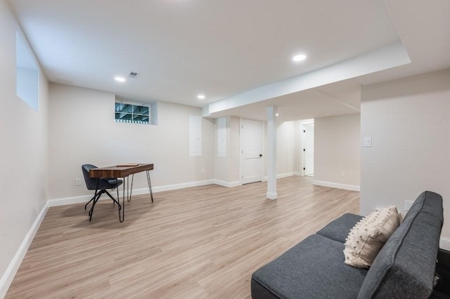 interior space featuring baseboards, recessed lighting, light wood-style flooring, and visible vents