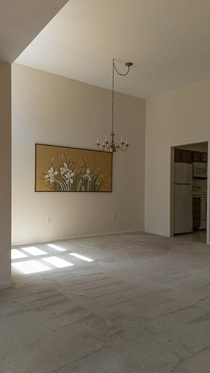 7 Brewster Ln Unit 7, Acton, MA 01720 - interior space featuring carpet floors and a notable chandelier