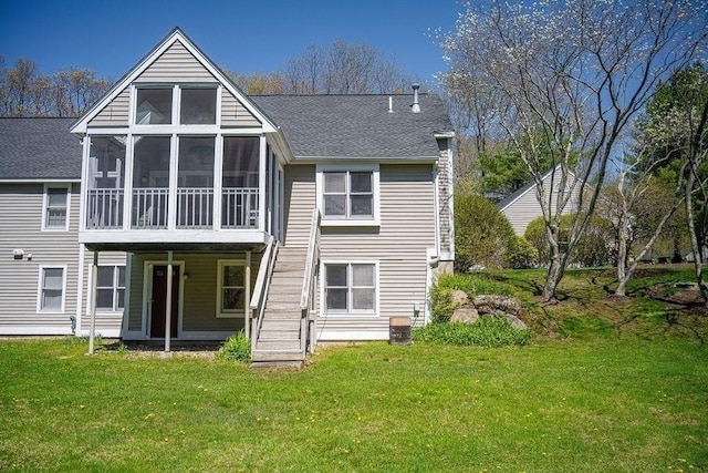 7 Brewster Ln Unit 7, Acton, MA 01720 - rear view of house featuring central air condition unit, a sunroom, a shingled roof, and a yard