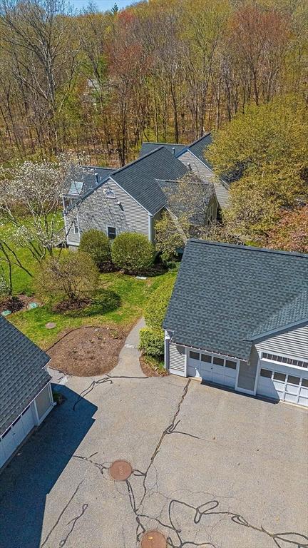 7 Brewster Ln Unit 7, Acton, MA 01720 - bird's eye view with a forest view