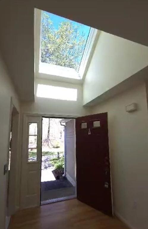 7 Brewster Ln Unit 7, Acton, MA 01720 - doorway featuring a high ceiling and wood finished floors