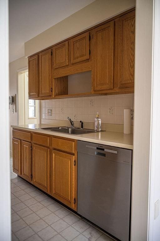 7 Brewster Ln Unit 7, Acton, MA 01720 - kitchen featuring open shelves, decorative backsplash, light countertops, brown cabinets, and dishwasher