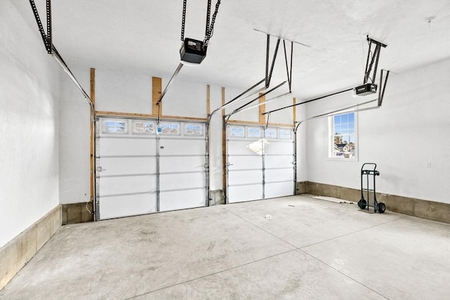 garage featuring a garage door opener