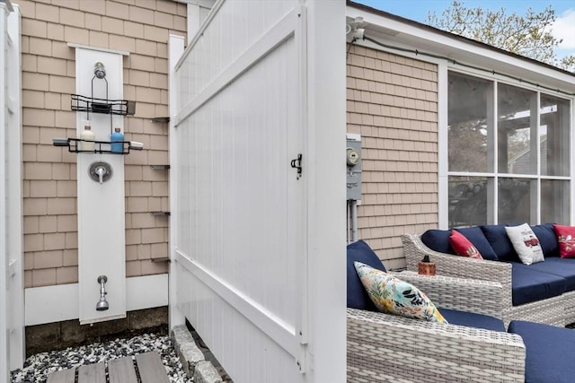 view of exterior entry with an outdoor hangout area