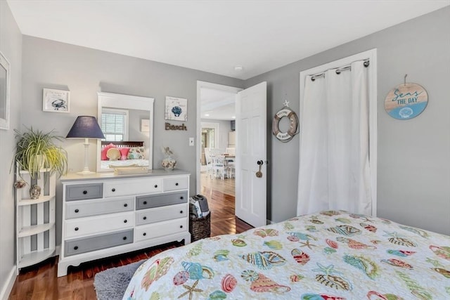 bedroom featuring wood finished floors