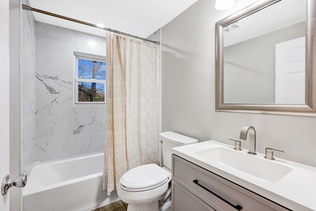 full bathroom featuring vanity, toilet, and shower / tub combo