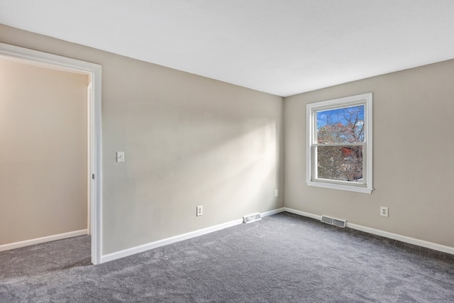 view of carpeted spare room