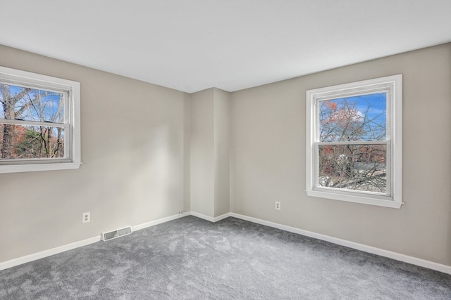 view of carpeted spare room