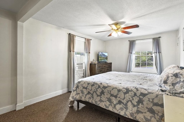 2 Putnam Ln, Auburn, MA 01501 - carpeted bedroom featuring ceiling fan, cooling unit, and a textured ceiling