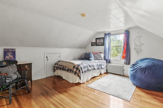 2 Putnam Ln, Auburn, MA 01501 - bedroom featuring radiator, wood finished floors, and vaulted ceiling