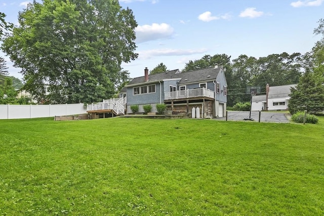 2 Putnam Ln, Auburn, MA 01501 - back of property featuring a deck, a chimney, and stairs