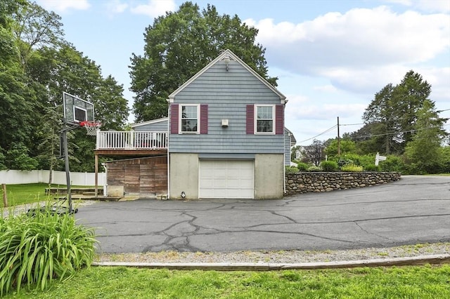 2 Putnam Ln, Auburn, MA 01501 - view of home's exterior with asphalt driveway