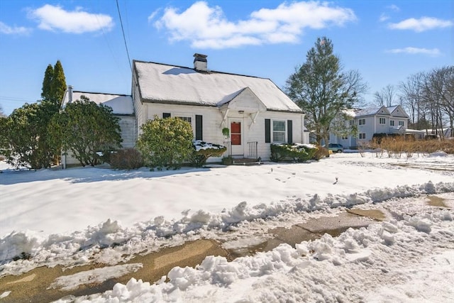 view of front of property with a chimney