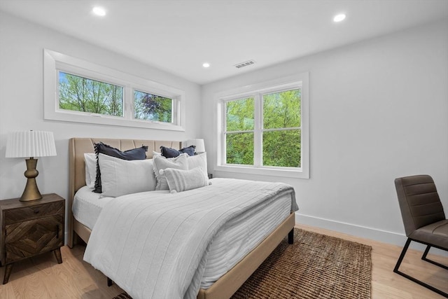 30A Emerald Rd, Nahant, MA 01908 - bedroom with multiple windows, recessed lighting, light wood finished floors, and baseboards