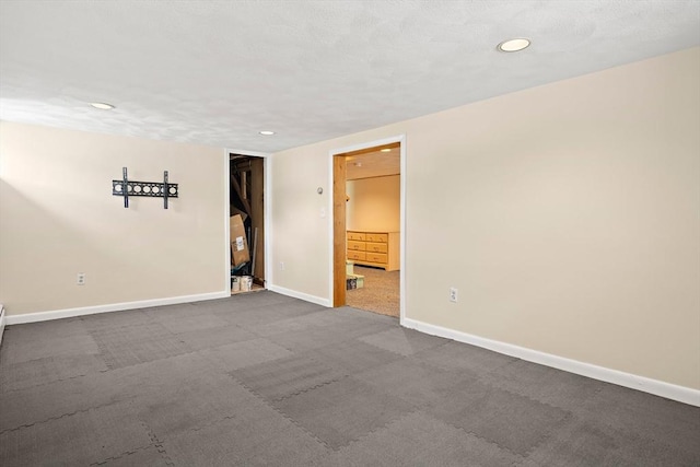 3 Manomet Rd, Woburn, MA 01801 - spare room with baseboards, recessed lighting, and dark carpet