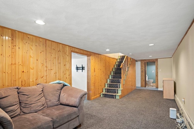 3 Manomet Rd, Woburn, MA 01801 - living area with stairway, wooden walls, carpet floors, recessed lighting, and baseboards