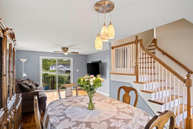 3 Manomet Rd, Woburn, MA 01801 - dining room featuring a ceiling fan, stairs, and wood finished floors