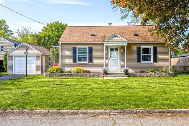 130 Roosevelt Ave, Chicopee, MA 01013 - view of front facade with an outbuilding, a front yard, and driveway