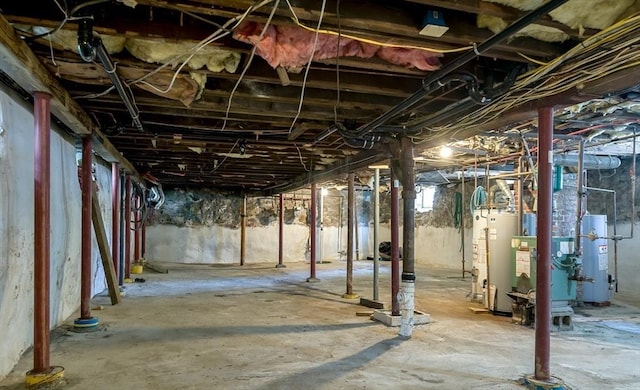 30-32 Loxwood St, Worcester, MA 01604 - unfinished basement with water heater