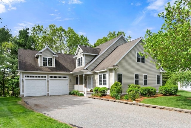 7 Lane Farm Dr Unit 7, Bedford, MA 01730 - view of front of property with asphalt driveway, a garage, roof with shingles, and a front lawn