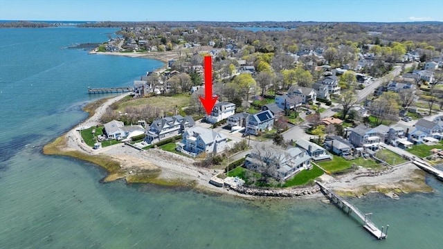 bird's eye view with a residential view and a water view