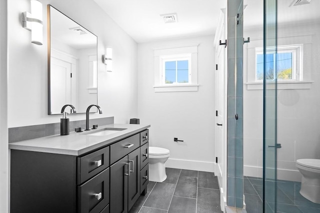 full bathroom with toilet, baseboards, and a wealth of natural light