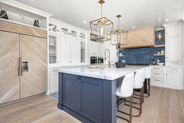 kitchen with white cabinetry, open shelves, wood ceiling, and light wood finished floors