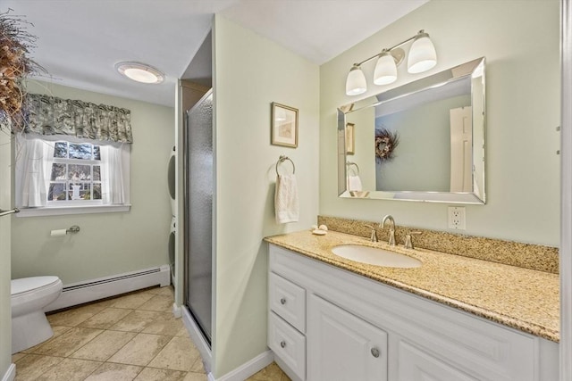 full bathroom with a baseboard heating unit, toilet, a stall shower, and vanity