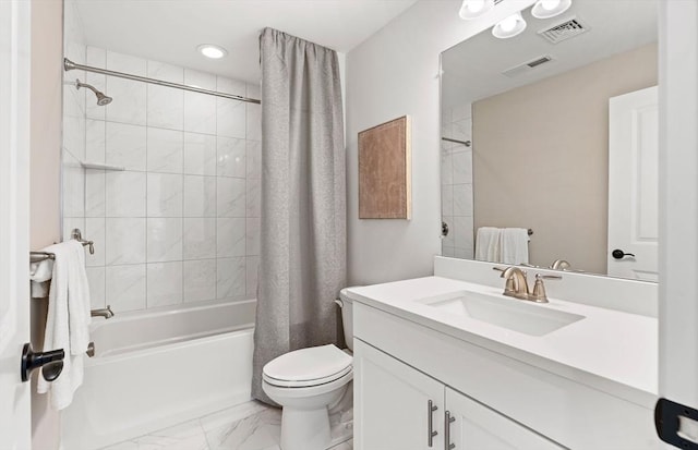 full bathroom with shower / bath combo, vanity, and toilet