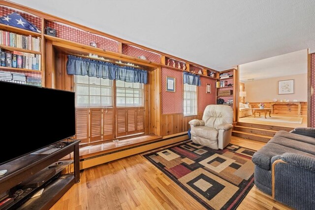 70 Bestick Rd, Braintree, MA 02184 - living area with wood finished floors and wood walls