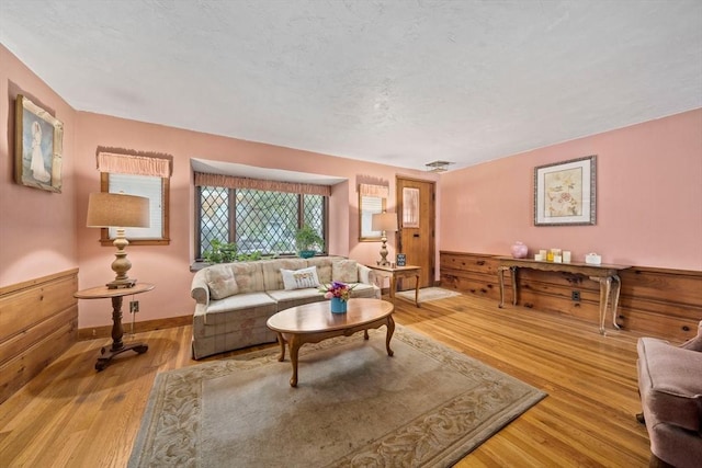 70 Bestick Rd, Braintree, MA 02184 - living room featuring wood finished floors and baseboards