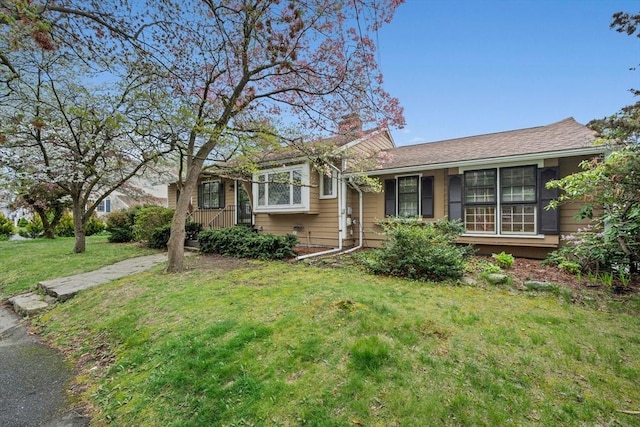 70 Bestick Rd, Braintree, MA 02184 - ranch-style home featuring a front yard and a chimney