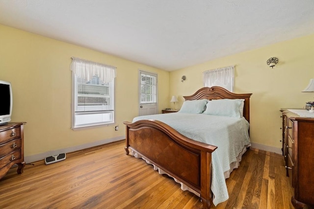 70 Bestick Rd, Braintree, MA 02184 - bedroom featuring wood finished floors and baseboards