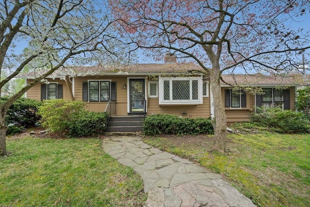 70 Bestick Rd, Braintree, MA 02184 - ranch-style home featuring a chimney and a front lawn