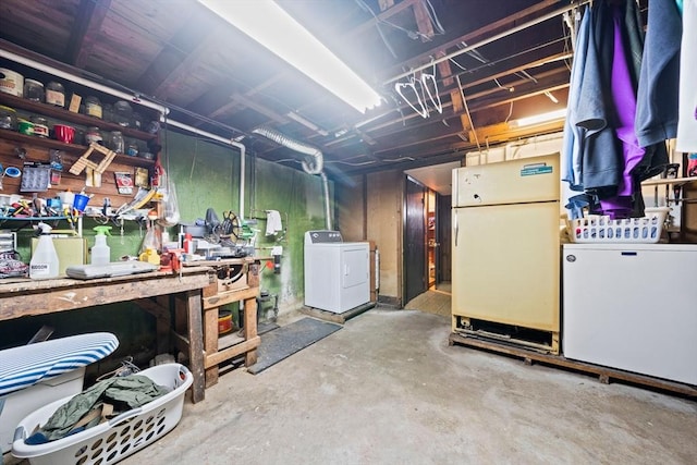 70 Bestick Rd, Braintree, MA 02184 - unfinished below grade area featuring washer / dryer, freestanding refrigerator, and refrigerator
