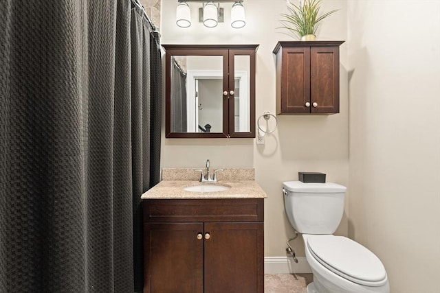 28 Broad St Unit 205, Marlborough, MA 01752 - full bathroom featuring toilet, vanity, and a shower with shower curtain