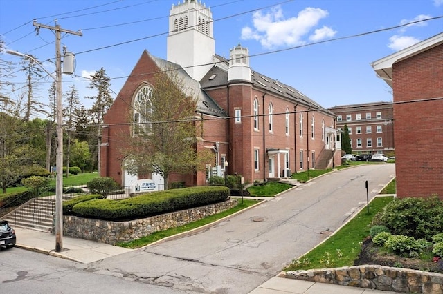 28 Broad St Unit 205, Marlborough, MA 01752 - view of asphalt road with curbs, street lighting, and sidewalks