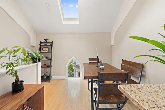 28 Broad St Unit 205, Marlborough, MA 01752 - dining room featuring light wood-type flooring and a skylight