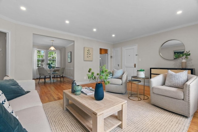74 Boylston St Unit 2, Newton, MA 02467 - living area with light wood-type flooring, ornamental molding, recessed lighting, and baseboards