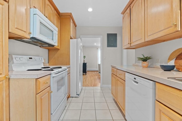 74 Boylston St Unit 2, Newton, MA 02467 - kitchen with white appliances, electric panel, light countertops, recessed lighting, and light brown cabinetry