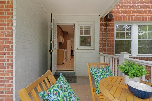 74 Boylston St Unit 2, Newton, MA 02467 - doorway to property featuring brick siding