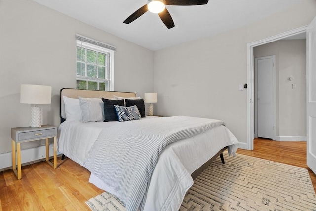 74 Boylston St Unit 2, Newton, MA 02467 - bedroom with light wood-style floors, baseboards, and ceiling fan
