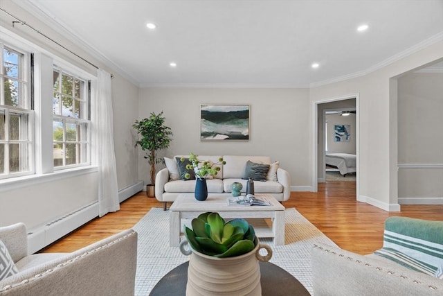 74 Boylston St Unit 2, Newton, MA 02467 - living area featuring light wood-type flooring, baseboard heating, crown molding, recessed lighting, and baseboards