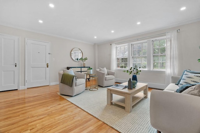 74 Boylston St Unit 2, Newton, MA 02467 - living room with wood finished floors, ornamental molding, recessed lighting, and baseboards