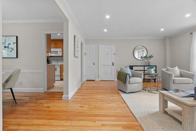 74 Boylston St Unit 2, Newton, MA 02467 - living room with light wood-style flooring, recessed lighting, ornamental molding, and baseboards