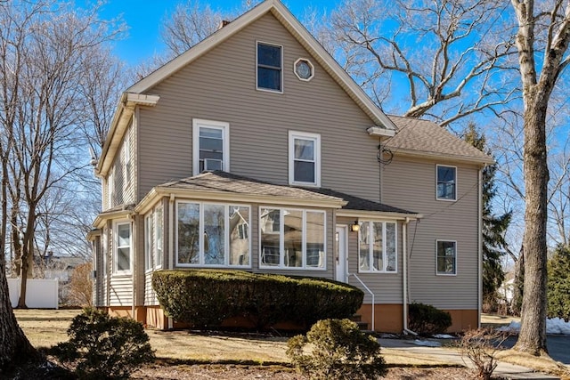 exterior space featuring a sunroom