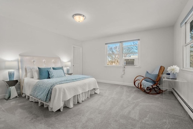 carpeted bedroom with baseboards, baseboard heating, and cooling unit