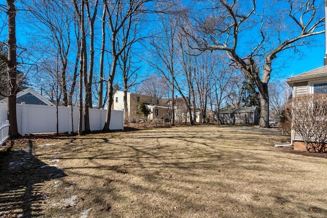 view of yard featuring fence